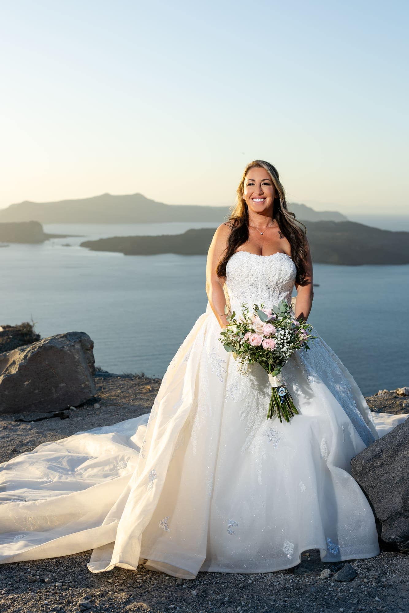 Mary & Chris — the vintage convertible and the blue-domed church, Windmill venue on the caldera, Santorini