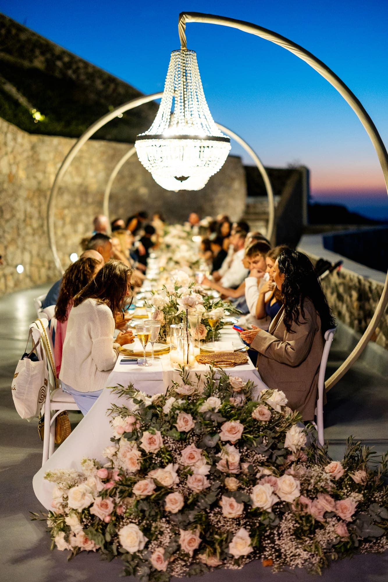 Mary & Chris — the champagne tower, the toasts and the cake, Windmill venue on the caldera, Santorini