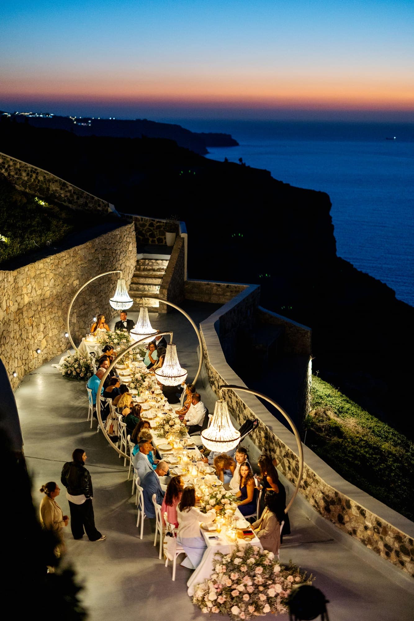 Mary & Chris — the champagne tower, the toasts and the cake, Windmill venue on the caldera, Santorini