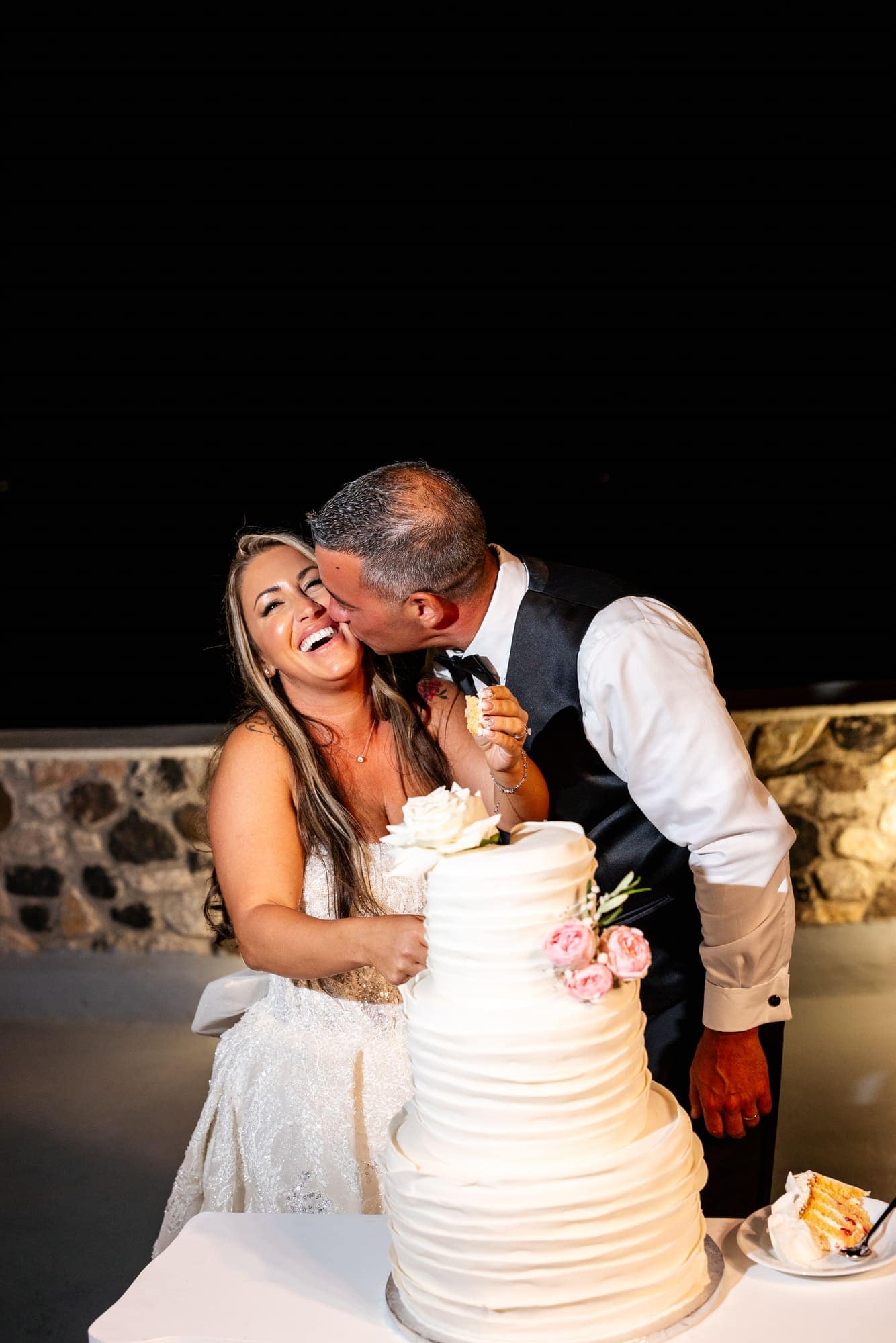 Mary & Chris — the champagne tower, the toasts and the cake, Windmill venue on the caldera, Santorini