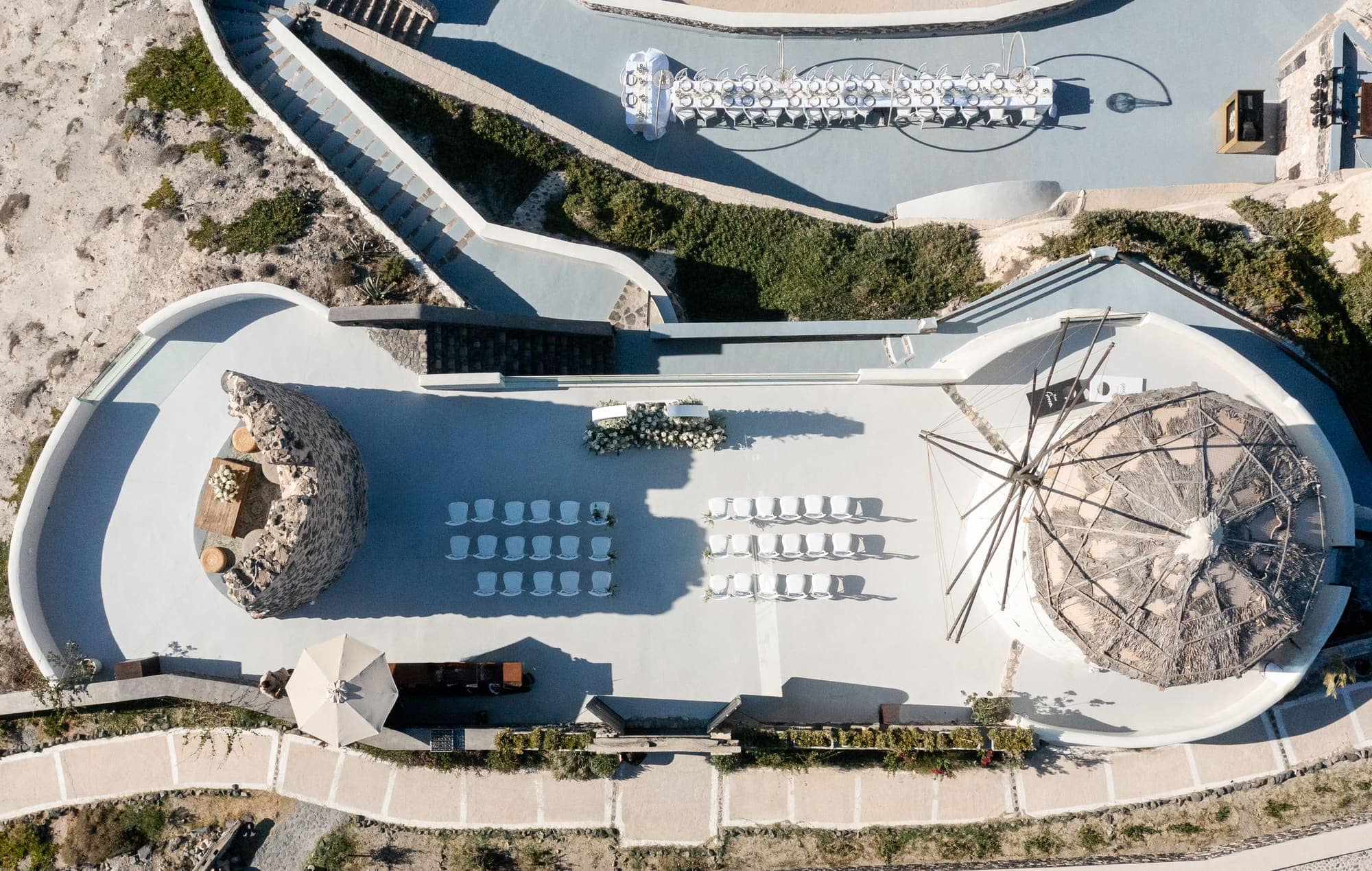 Mary & Chris — the windmill venue seen from above, Windmill venue on the caldera, Santorini
