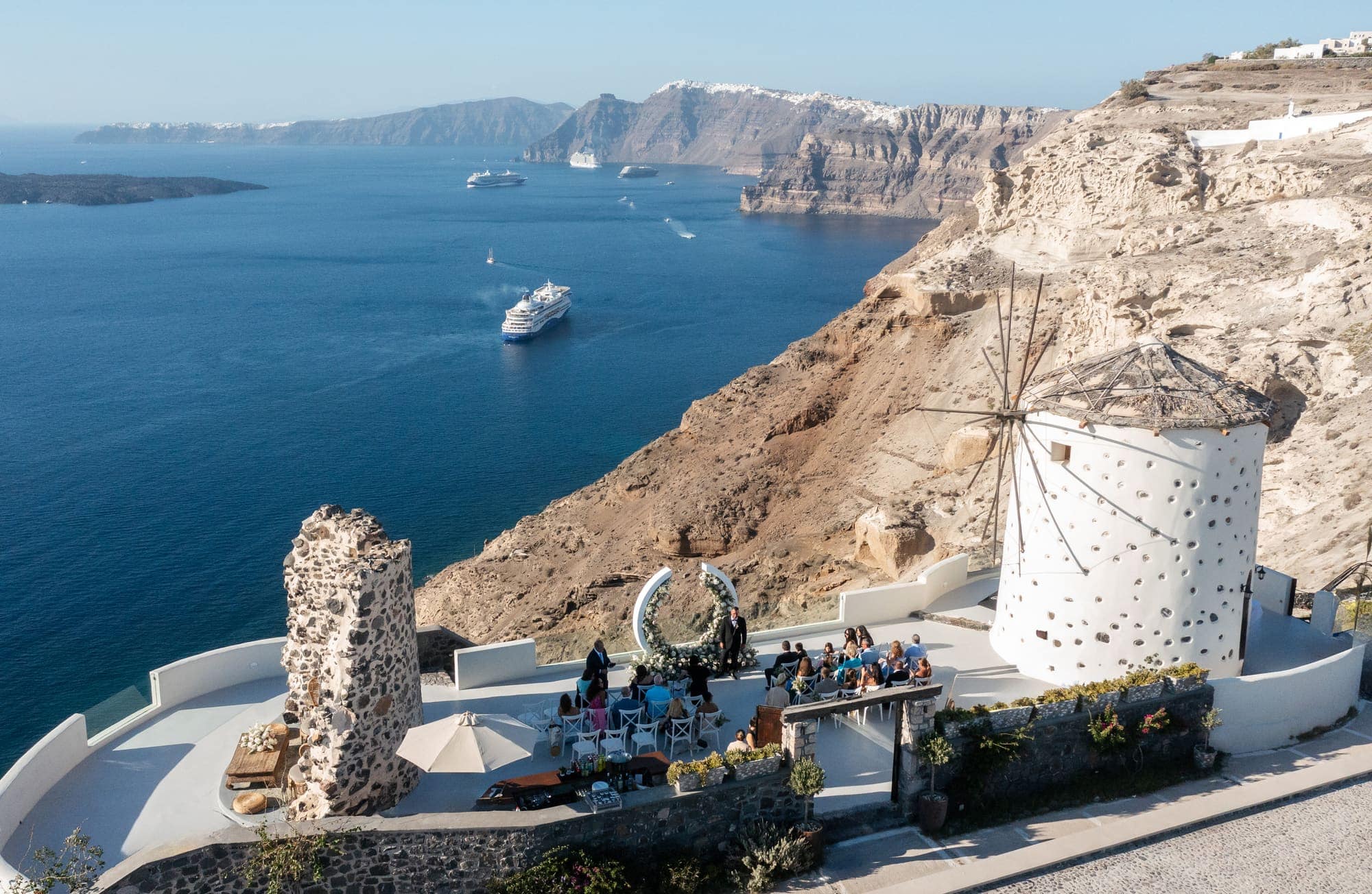 Mary & Chris — the windmill venue seen from above, Windmill venue on the caldera, Santorini