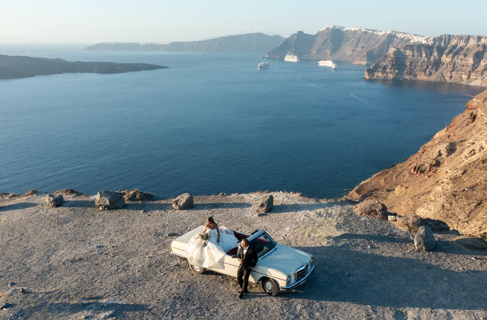 Mary & Chris — the windmill venue seen from above, Windmill venue on the caldera, Santorini