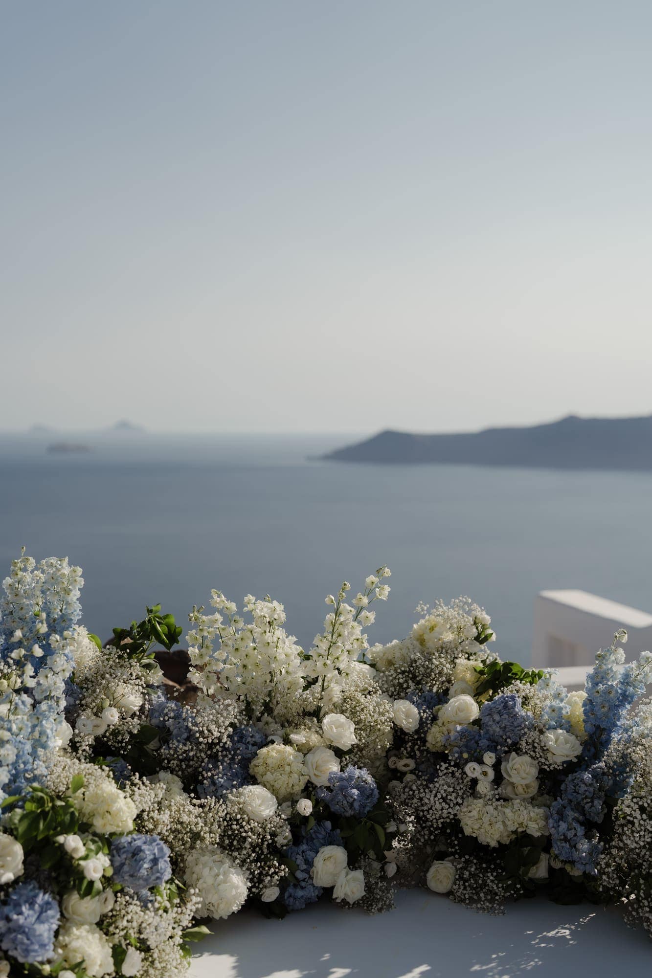 Tina & Kanon — the details and the ceremony circle above the caldera, Cliffside terrace, Santorini