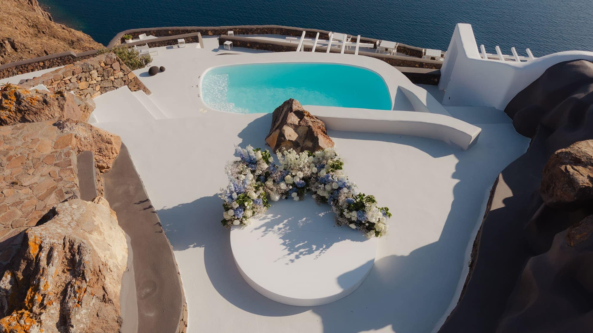 Tina & Kanon — the details and the ceremony circle above the caldera, Cliffside terrace, Santorini
