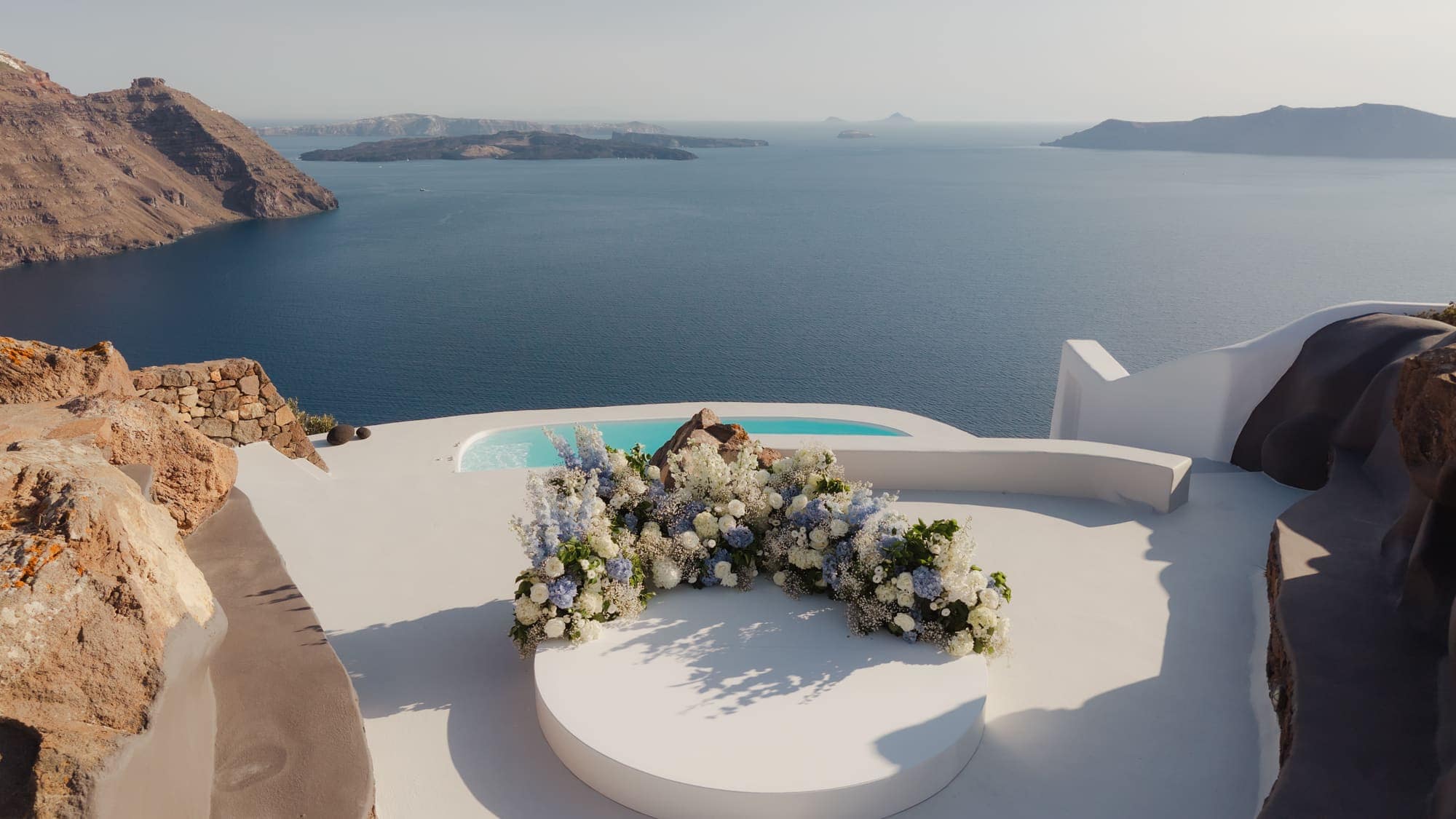 Tina & Kanon — the details and the ceremony circle above the caldera, Cliffside terrace, Santorini