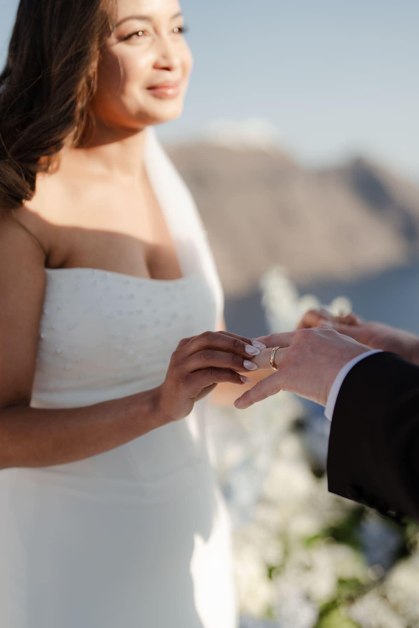Tina & Kanon — the ceremony and the exchange of vows, Cliffside terrace, Santorini