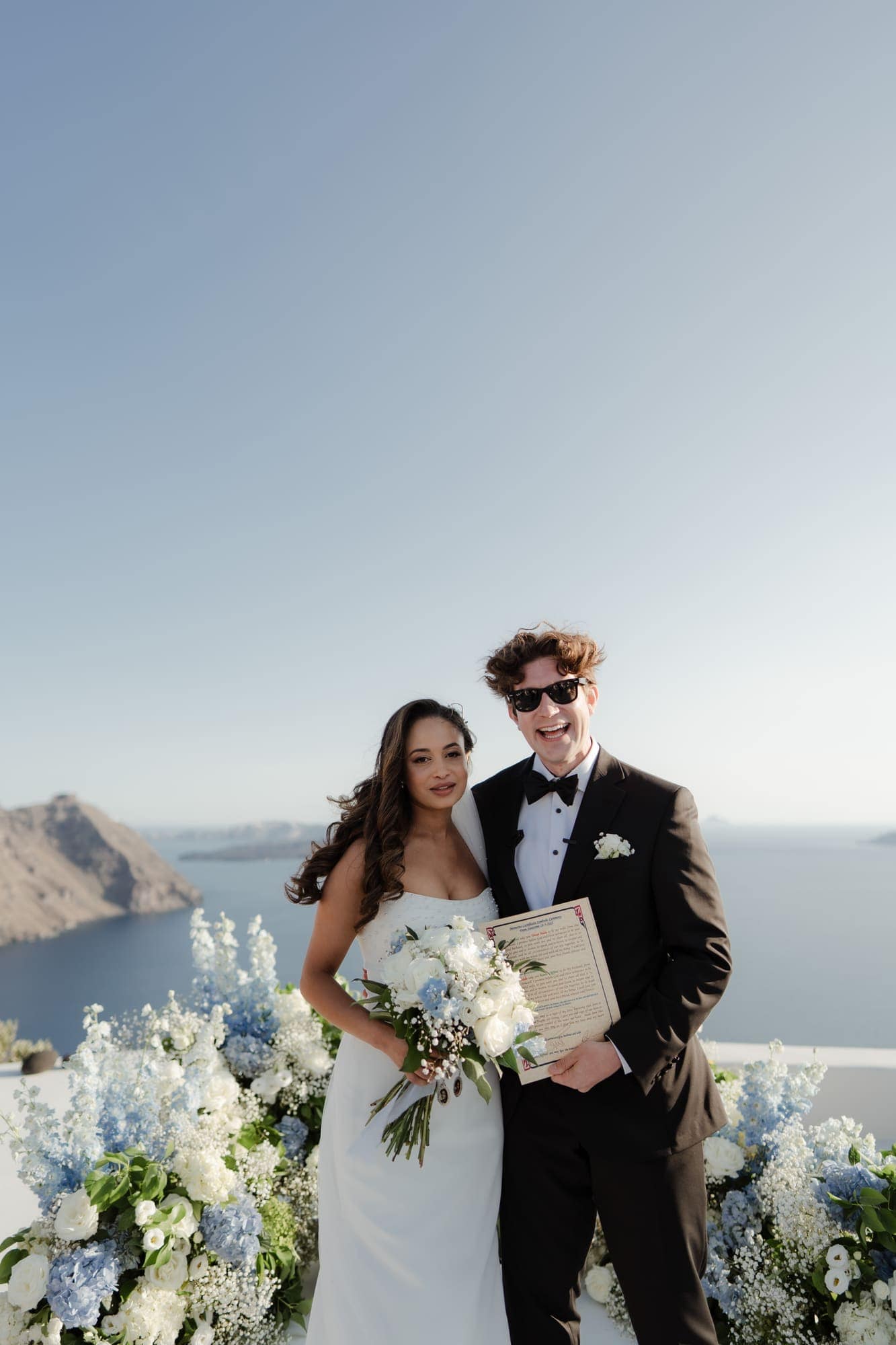 Tina & Kanon — the first portraits and the family who travelled with them, Cliffside terrace, Santorini