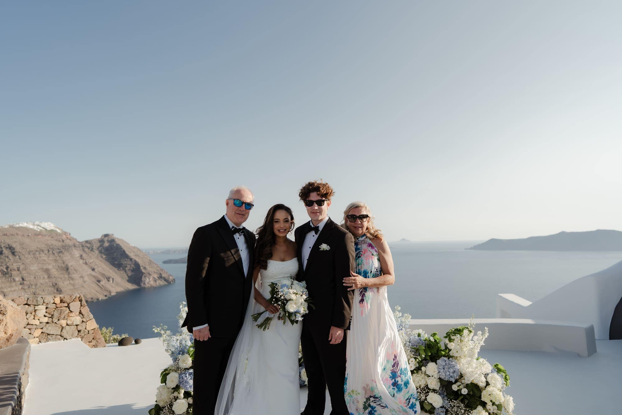 Tina & Kanon — the first portraits and the family who travelled with them, Cliffside terrace, Santorini