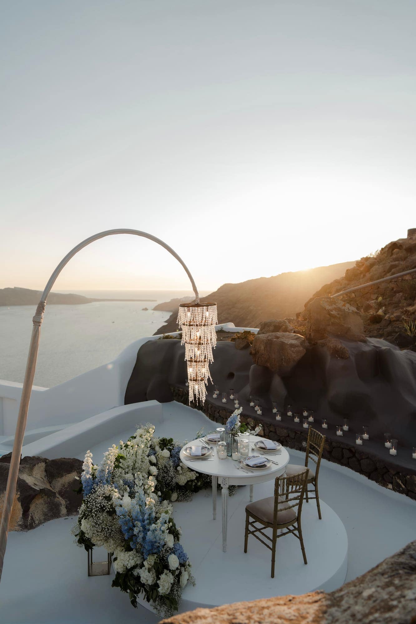 Tina & Kanon — a private dinner for two above the caldera, Cliffside terrace, Santorini
