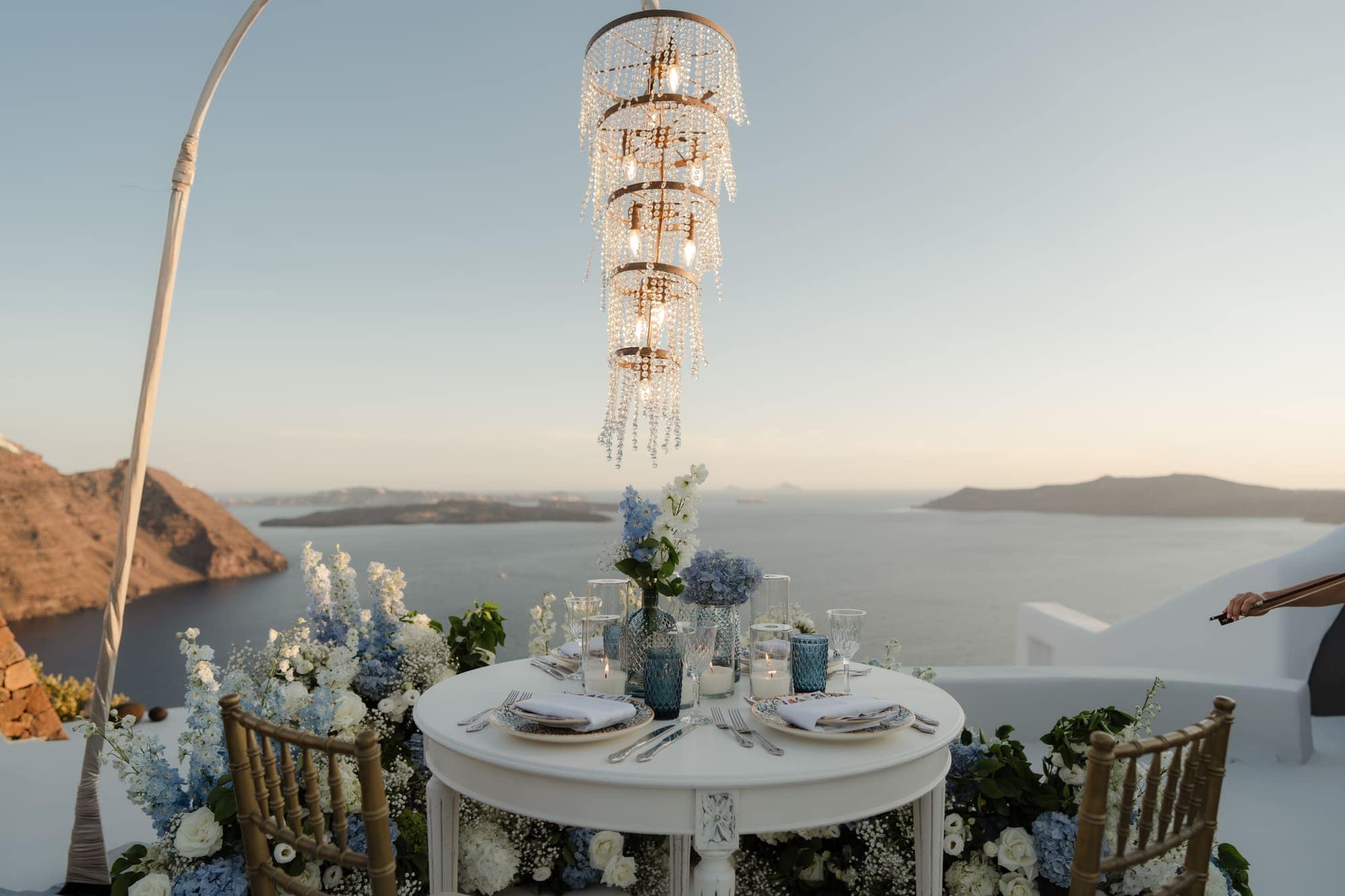 Tina & Kanon — a private dinner for two above the caldera, Cliffside terrace, Santorini