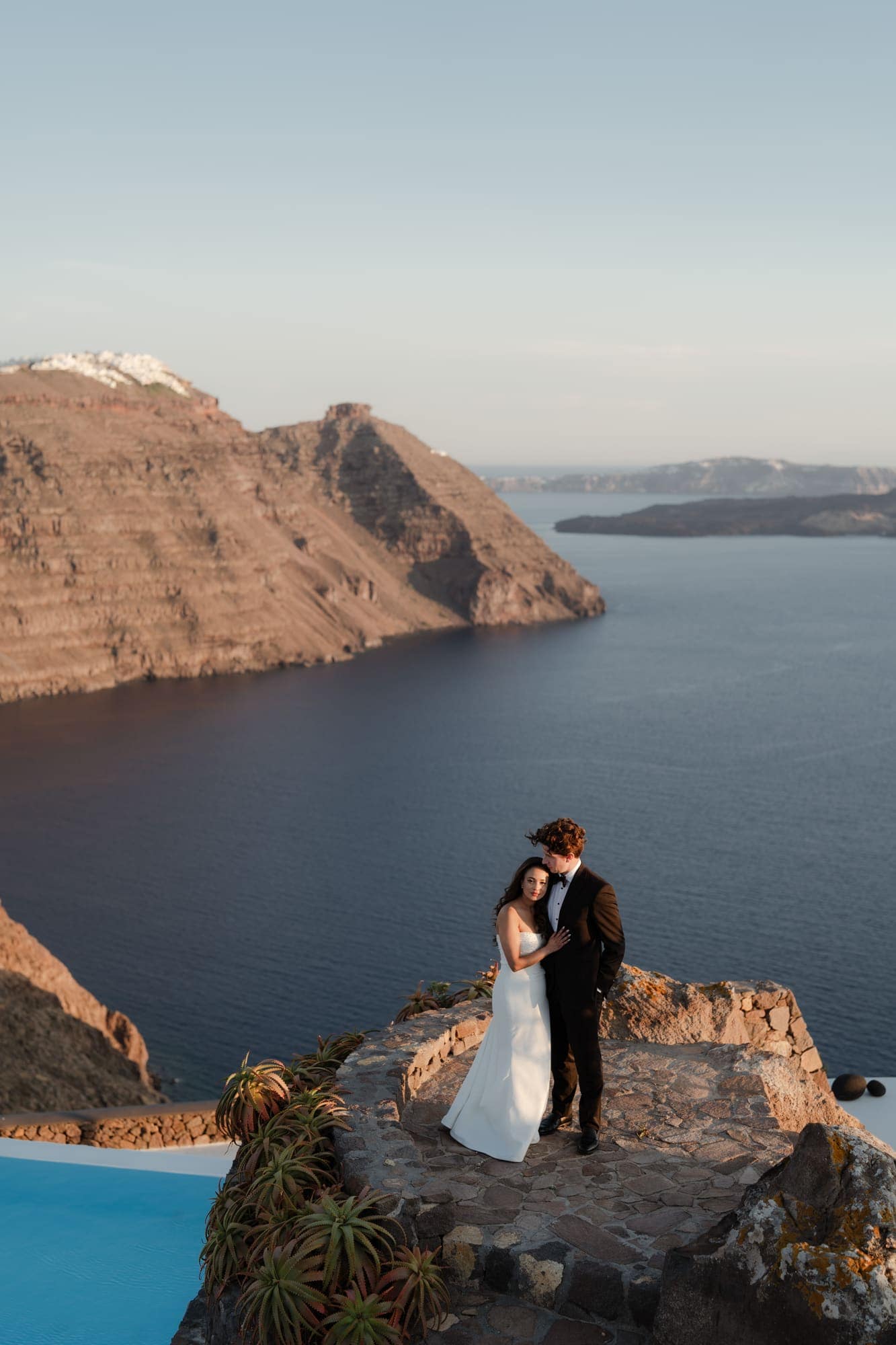 Tina & Kanon — the last portraits on the caldera edge, Cliffside terrace, Santorini